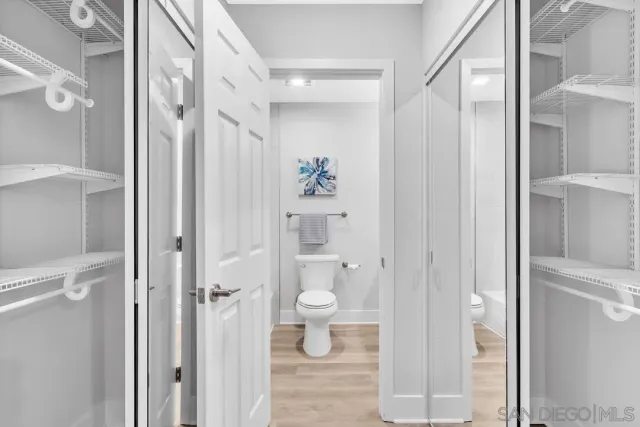 a bathroom with a shower and a toilet