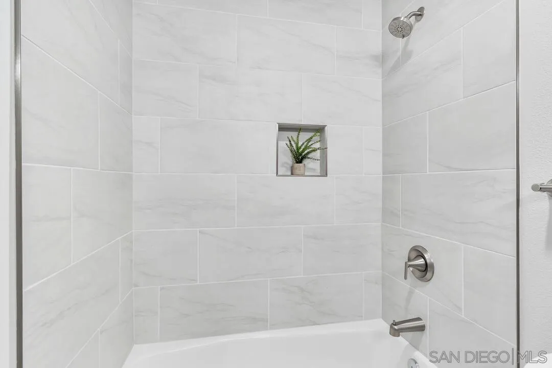 8644 Via Mallorca, Unit F La Jolla, CA 92037 - Photo 22 of 34 a bathroom with a shower