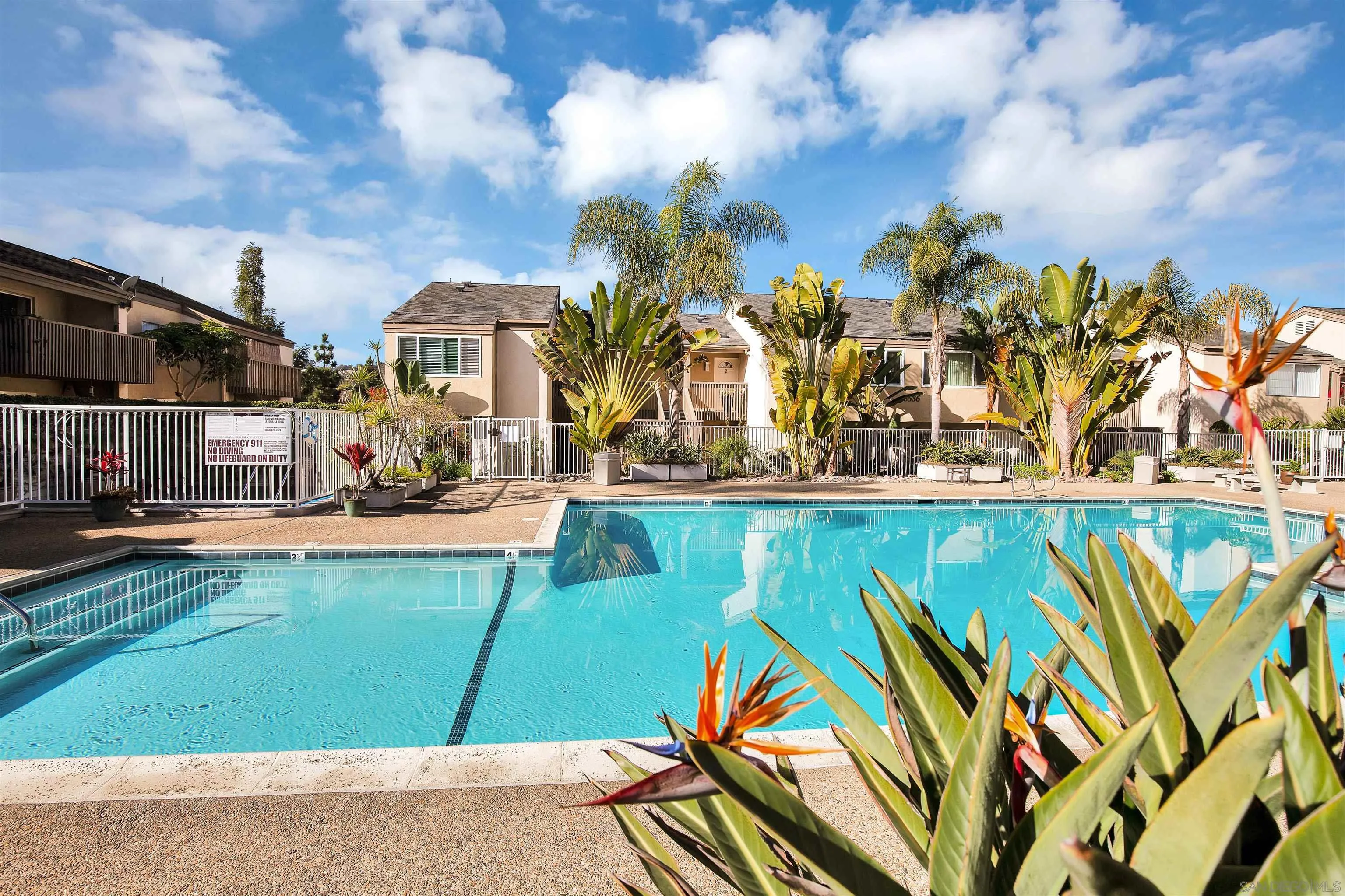 8644 Via Mallorca, Unit F La Jolla, CA 92037 - Photo 30 of 34 a view of swimming pool yard and outdoor seating