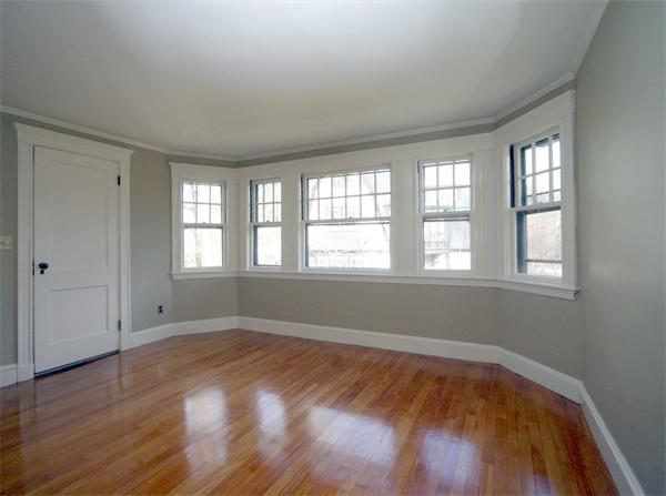 14 Woodleigh Road Dedham, MA 02026 - Photo 11 of 24 a view of an empty room with wooden floor and a window