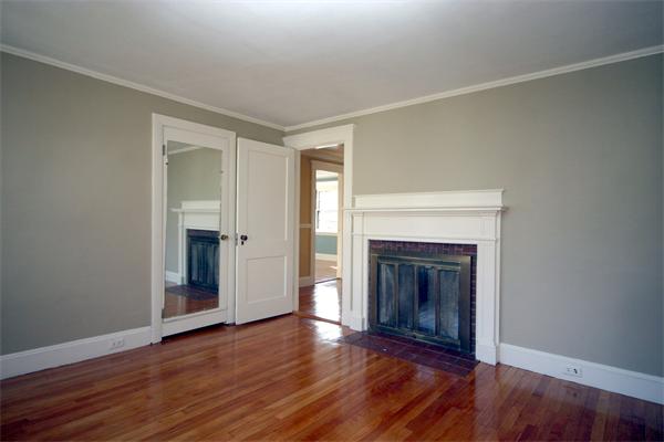 14 Woodleigh Road Dedham, MA 02026 - Photo 12 of 24 a view of a livingroom with wooden floor and a fireplace