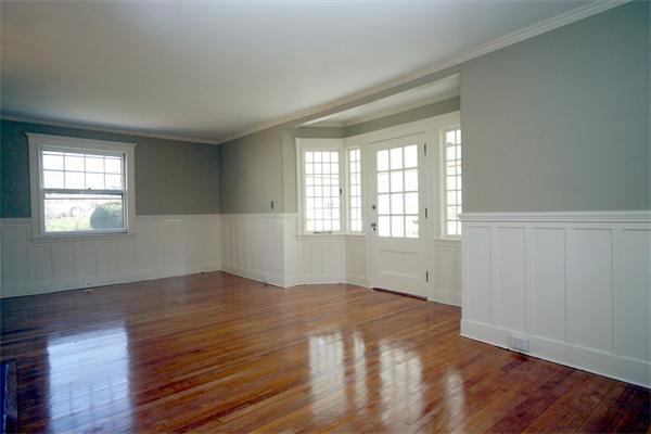 14 Woodleigh Road Dedham, MA 02026 - Photo 4 of 24 an empty room with wooden floor and windows
