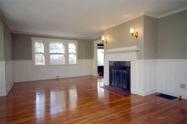 14 Woodleigh Road Dedham, MA 02026 - Photo 5 of 24 an empty room with wooden floor and fireplace