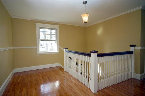 14 Woodleigh Road Dedham, MA 02026 - Photo 10 of 24 a view of a room with wooden floor windows and stairs