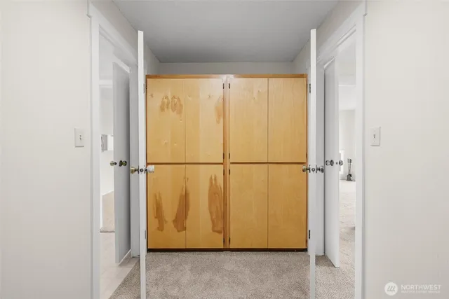 a bathroom with a sink a mirror and a vanity