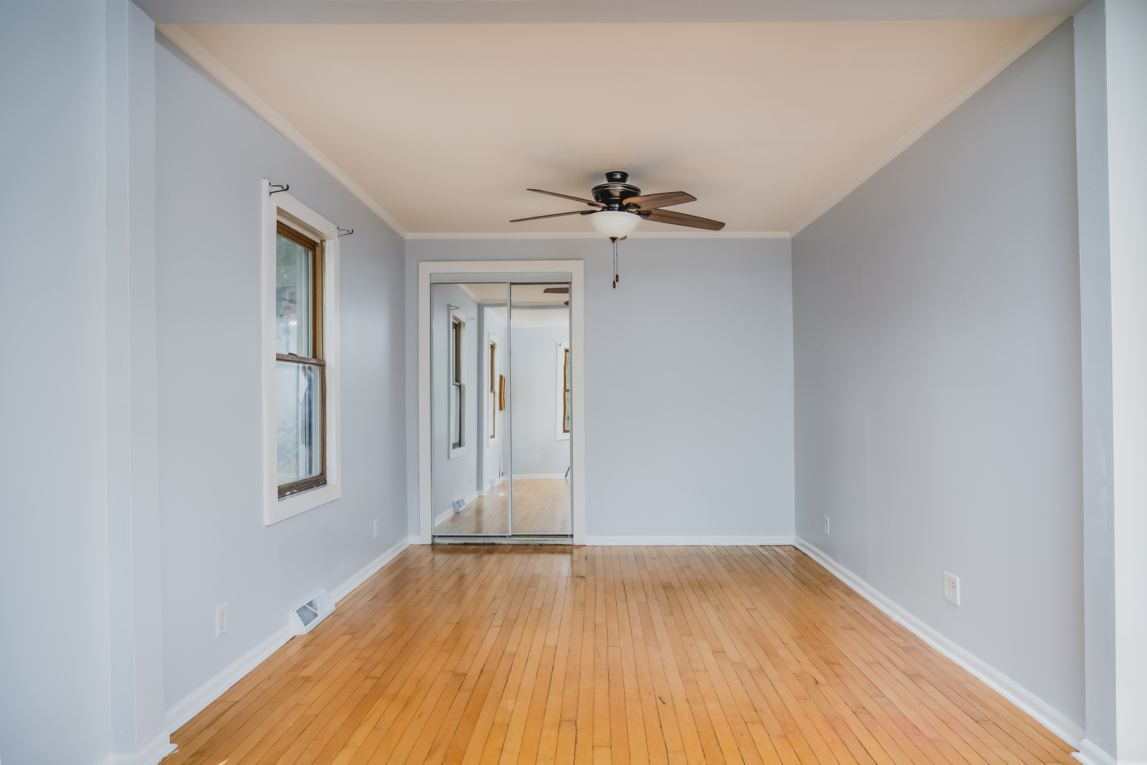 37902 North West Street Spring Grove, IL 60081 - Photo 10 of 26 a view of empty room with wooden floor and fan