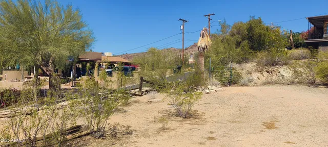 a view of a yard covered in snow