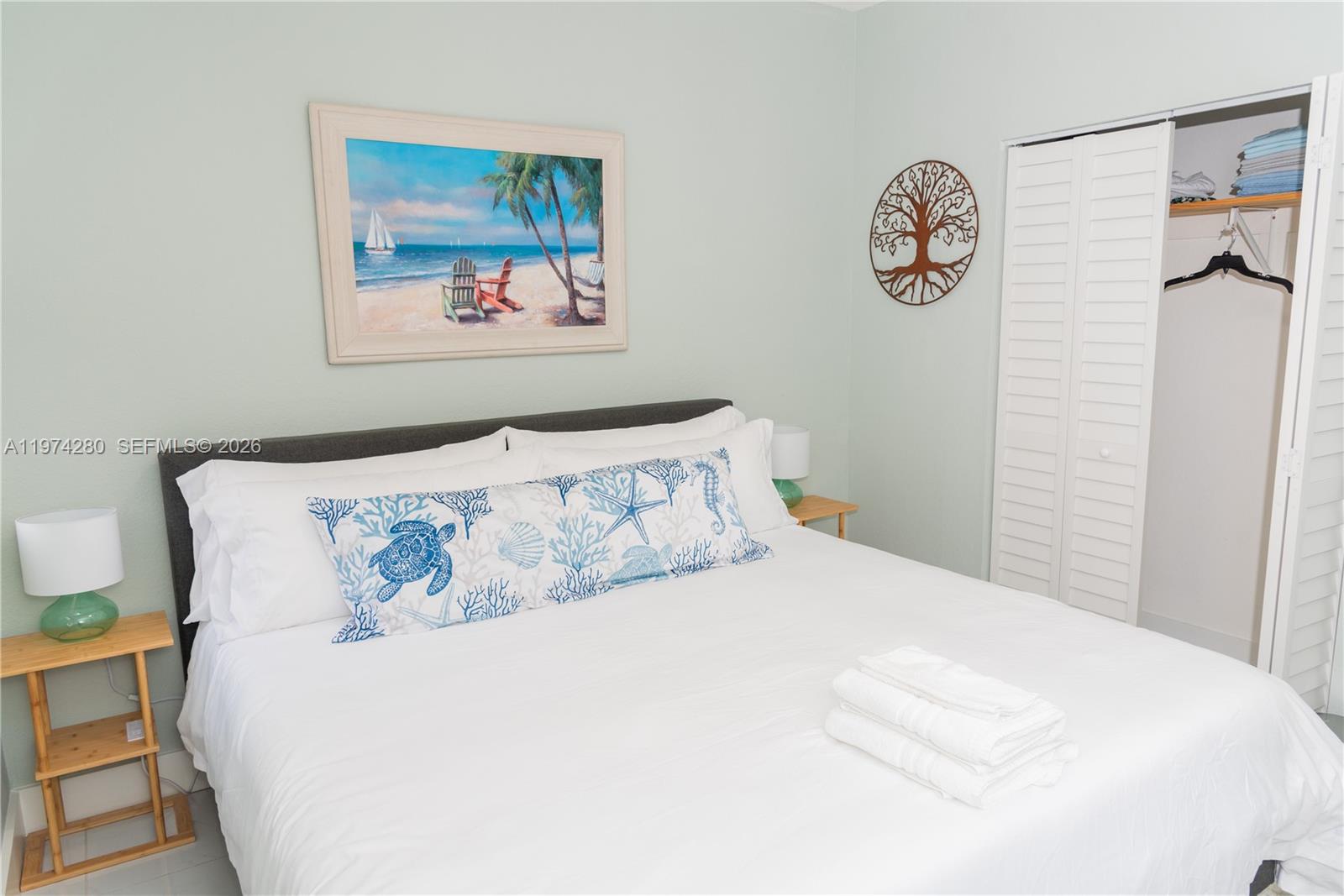 3134 Carter Street Miami, FL 33133 - Photo 11 of 36 a bedroom with a bed and a wall painting