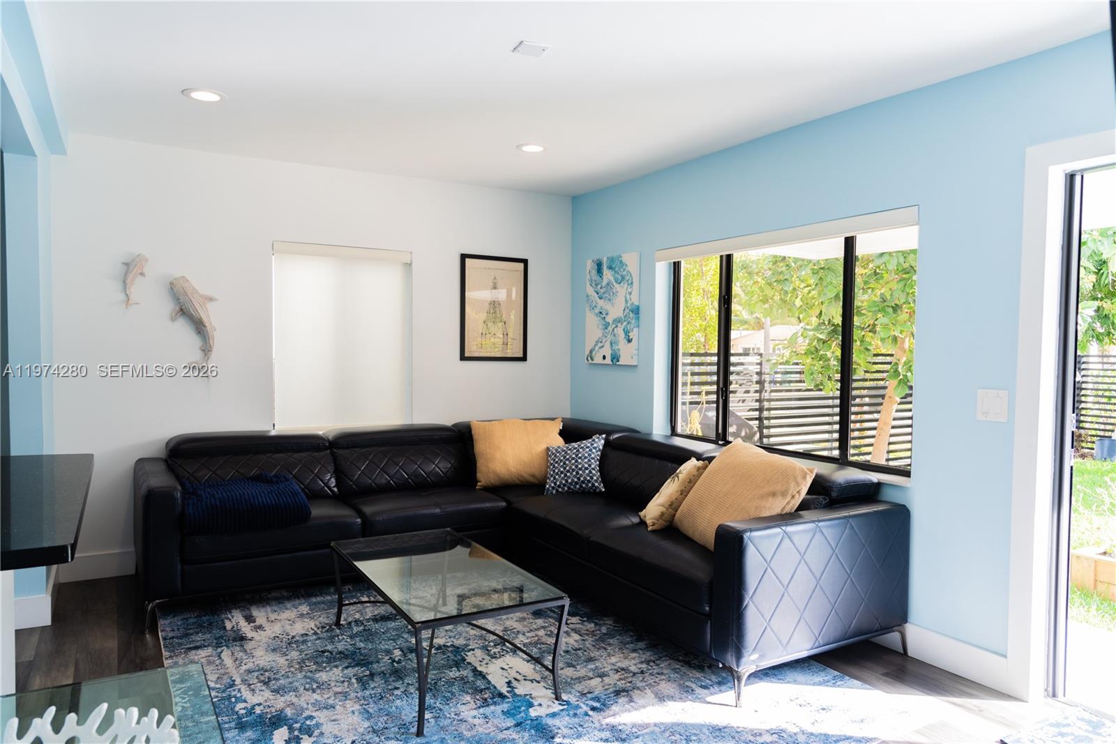 3134 Carter Street Miami, FL 33133 - Photo 33 of 36 a living room with furniture and a window