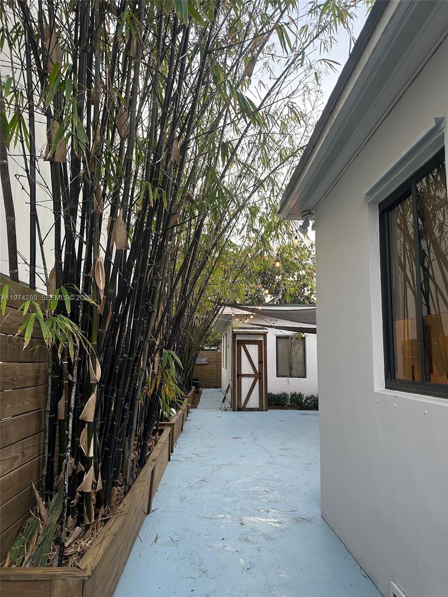 3134 Carter Street Miami, FL 33133 - Photo 6 of 36 a view of a house with a backyard
