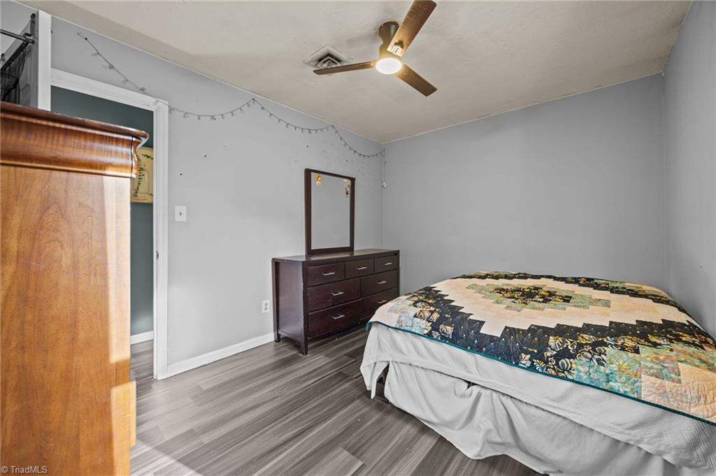 931 Ransom Road Winston-Salem, NC 27106 - Photo 21 of 48 Third bedroom with closet space and ceiling fan.