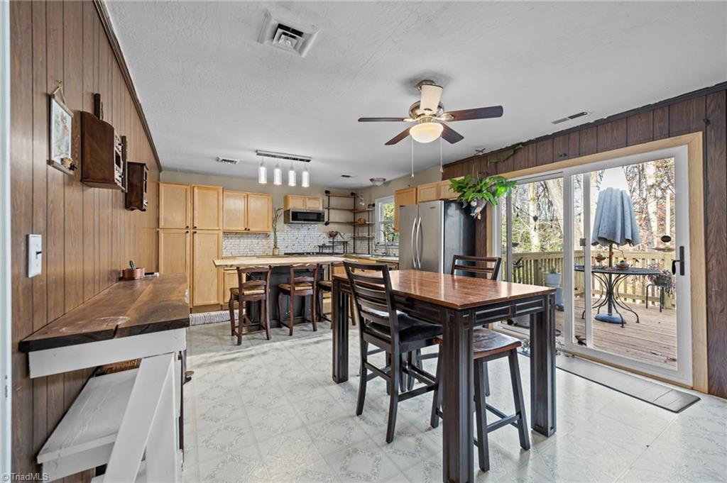 931 Ransom Road Winston-Salem, NC 27106 - Photo 3 of 48 View of the kitchen and dining area on the main floor.