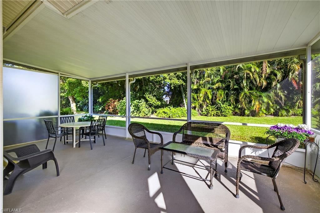 20818 Blacksmith Estero, FL 33928 - Photo 16 of 21 a view of chairs and table in patio