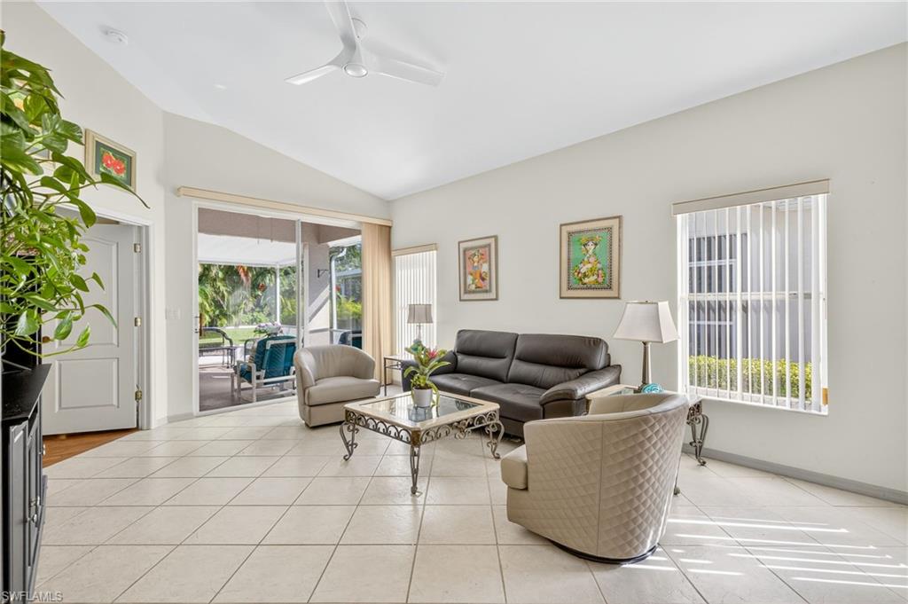 20818 Blacksmith Estero, FL 33928 - Photo 8 of 21 a living room with furniture and a window