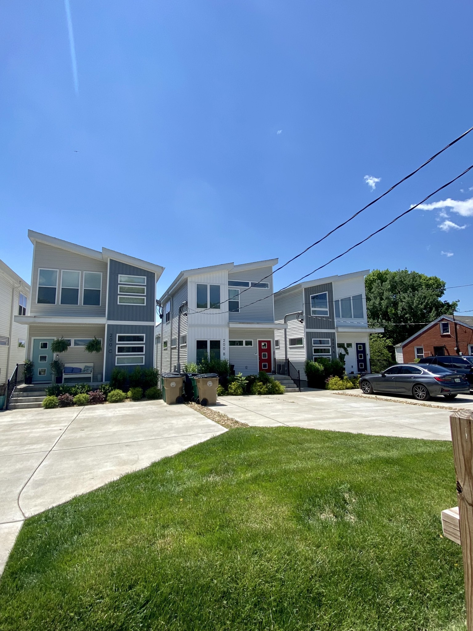 200 B Sunset Drive Nashville, TN 37207 - Photo 3 of 31 a wooden bench sitting in front of a building