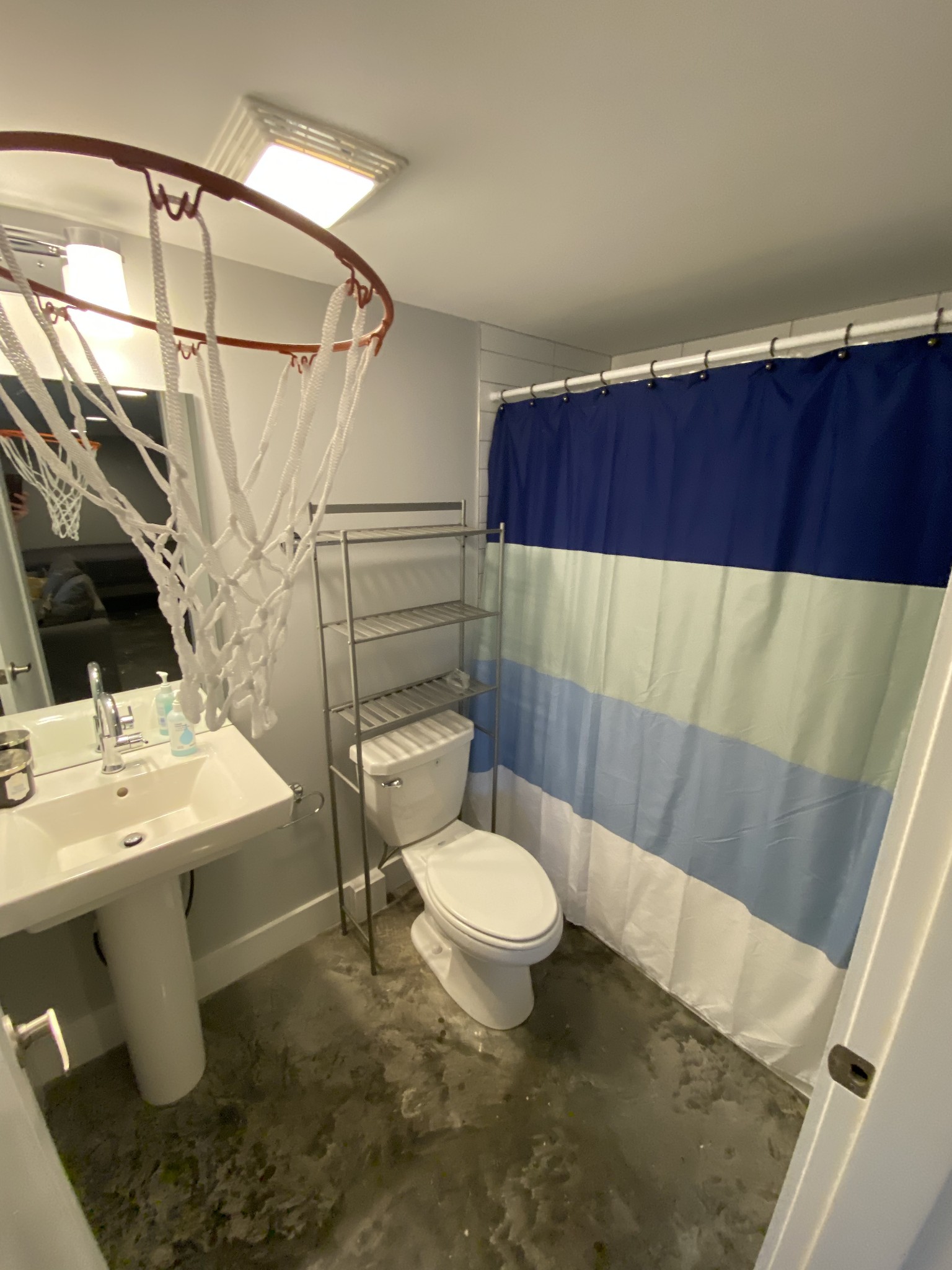 200 B Sunset Drive Nashville, TN 37207 - Photo 28 of 31 a bathroom with a sink toilet and mirror