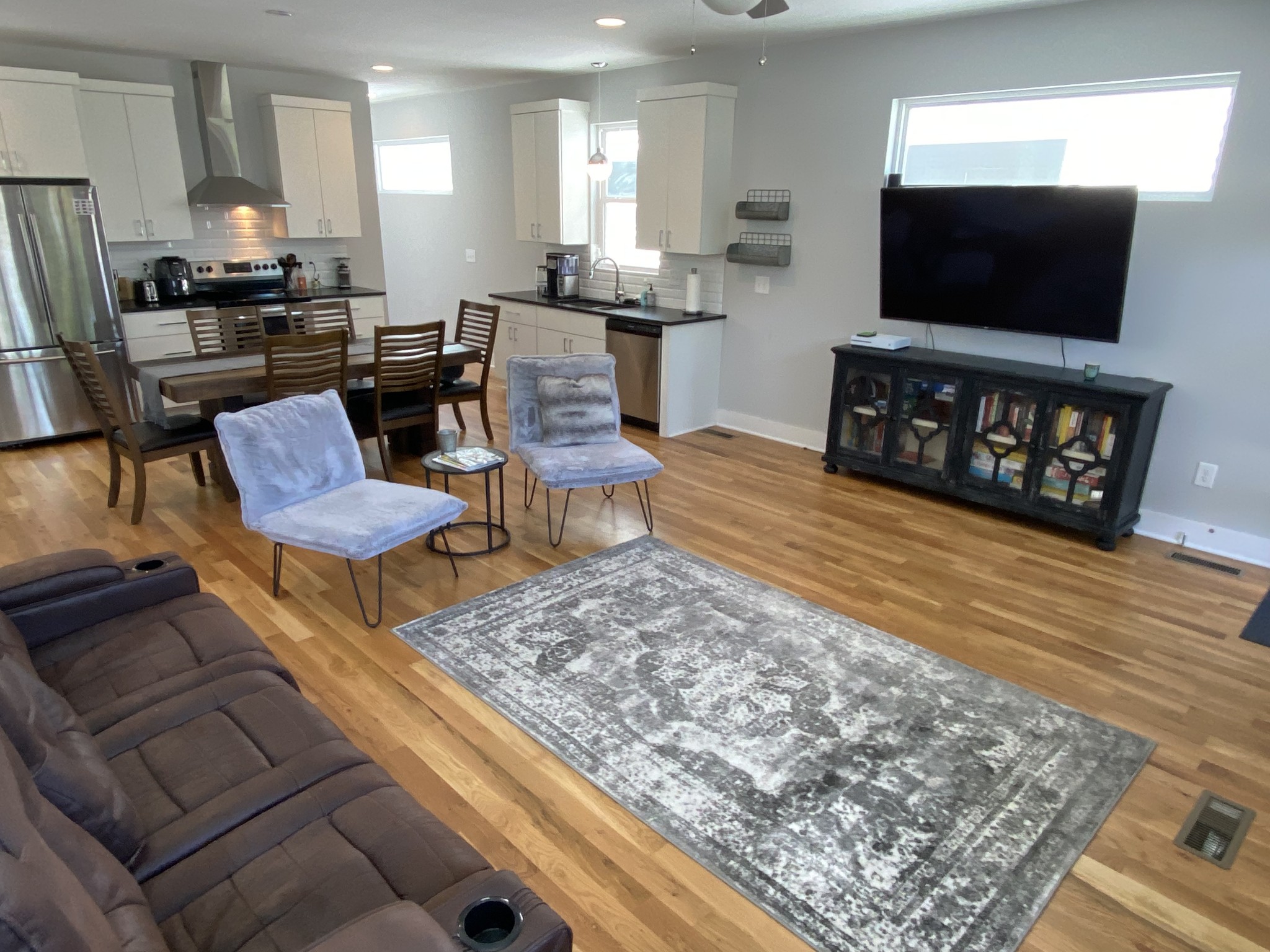200 B Sunset Drive Nashville, TN 37207 - Photo 7 of 31 a living room with furniture and a flat screen tv