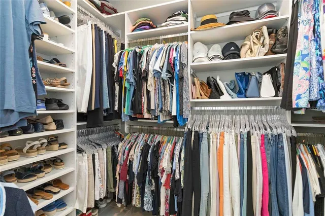 a utility room with sink dryer and washer