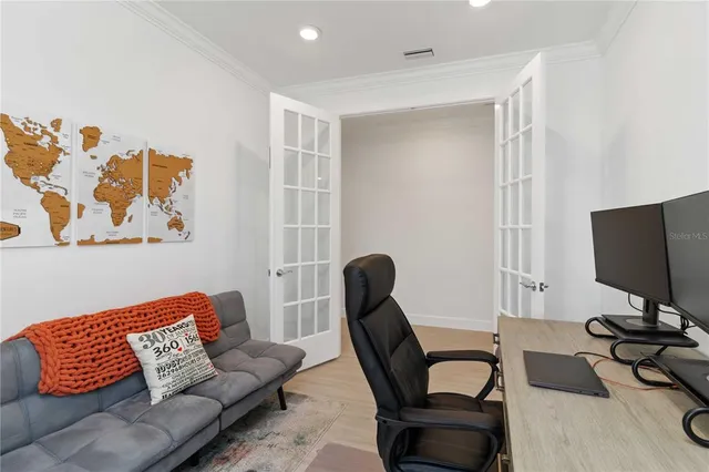 a living room with fireplace furniture and a fireplace