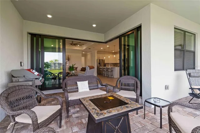 an aerial view of a swimming pool patio and mountain view
