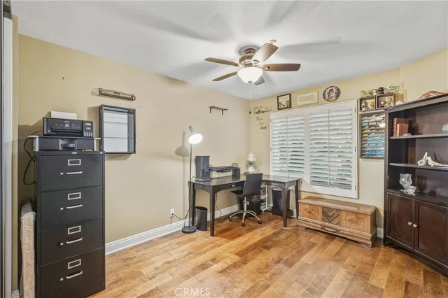 a view of a workspace with furniture