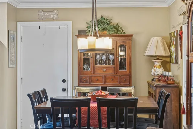 a view of a backyard with chair and table