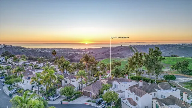 a view of an ocean and mountain