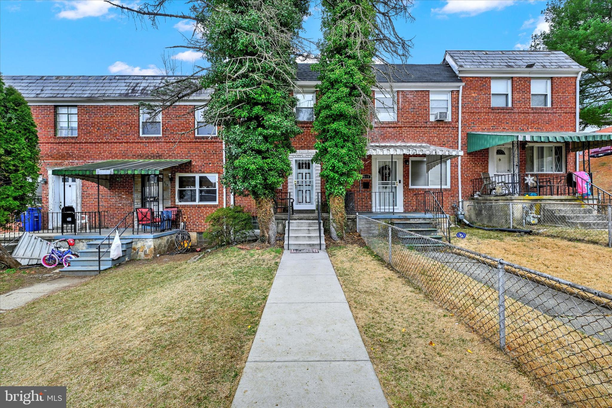 517 Random Road Baltimore, MD 21229 - Photo 13 of 13 a view of a brick building with many windows