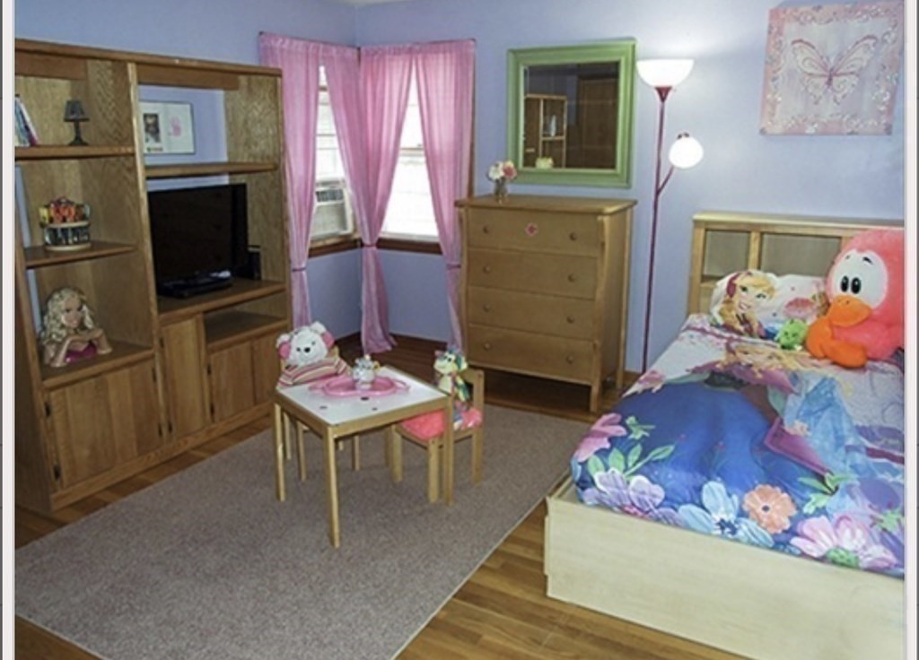 19 Simone Street Worcester, MA 01604 - Photo 12 of 14 a living room with furniture and a flat screen tv
