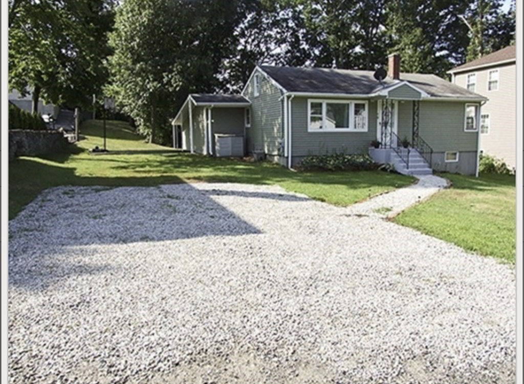 19 Simone Street Worcester, MA 01604 - Photo 3 of 14 a front view of a house with a yard