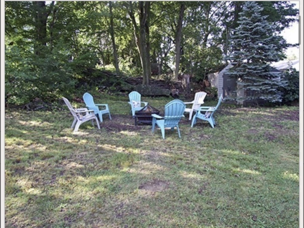 19 Simone Street Worcester, MA 01604 - Photo 6 of 14 a view of a sitting area with chairs and table
