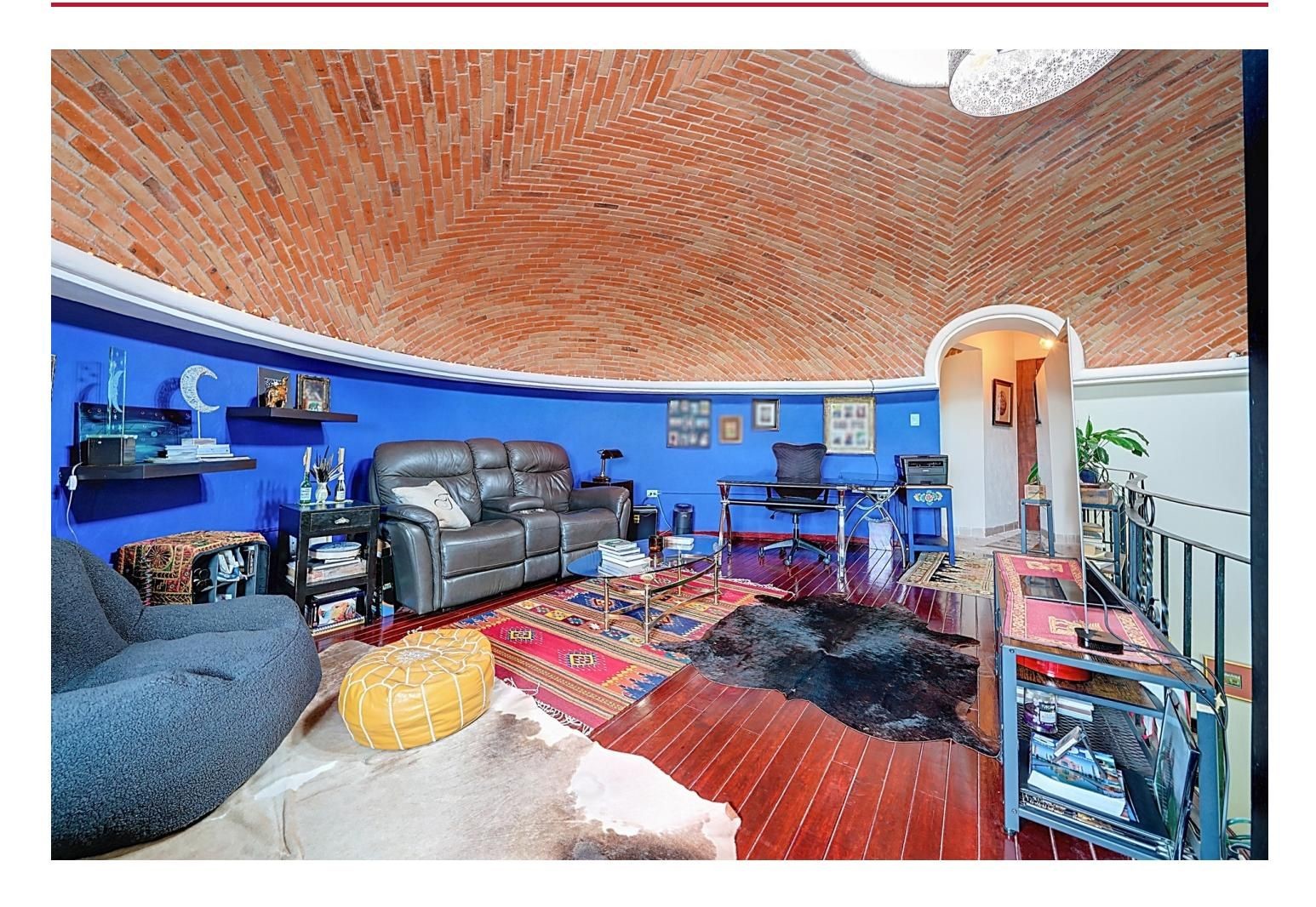 6 Rancho Los Labradores Vonore, TN 37885 - Photo 21 of 30 a living room with furniture a rug and a chandelier