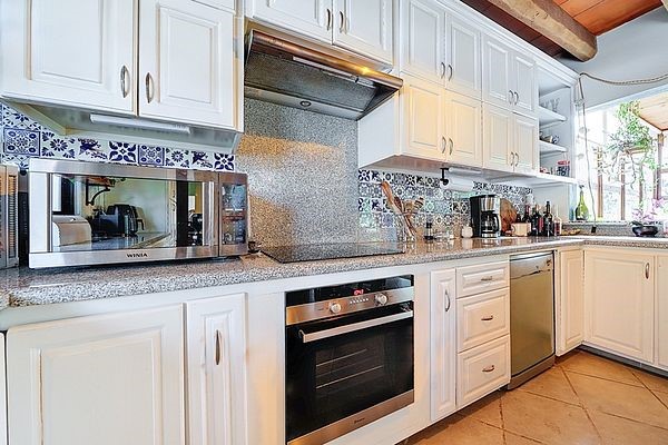 6 Rancho Los Labradores Vonore, TN 37885 - Photo 6 of 30 a kitchen with stainless steel appliances granite countertop a sink and cabinets