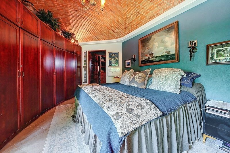 6 Rancho Los Labradores Vonore, TN 37885 - Photo 10 of 30 a bedroom with a large bed and a flat tv screen on dresser