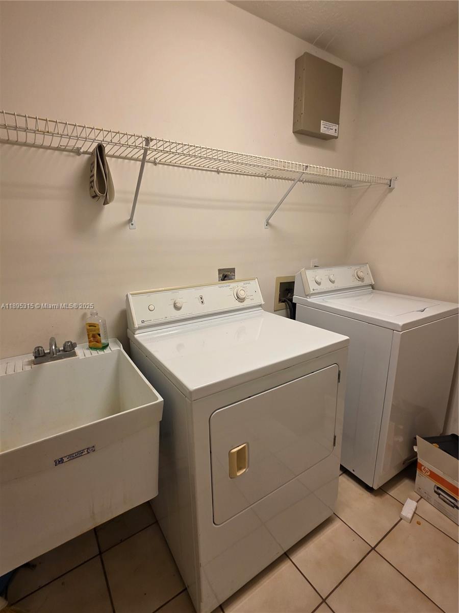 4802 Matanzas Avenue Fort Pierce, FL 34946 - Photo 21 of 28 a utility room with dryer and washer