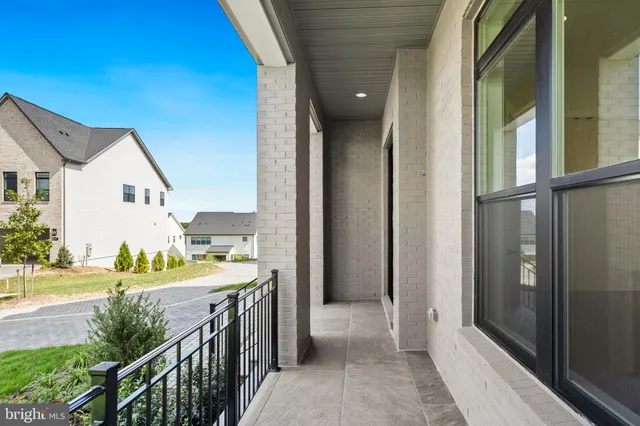 a view of a livingroom with a fireplace and wooden floor