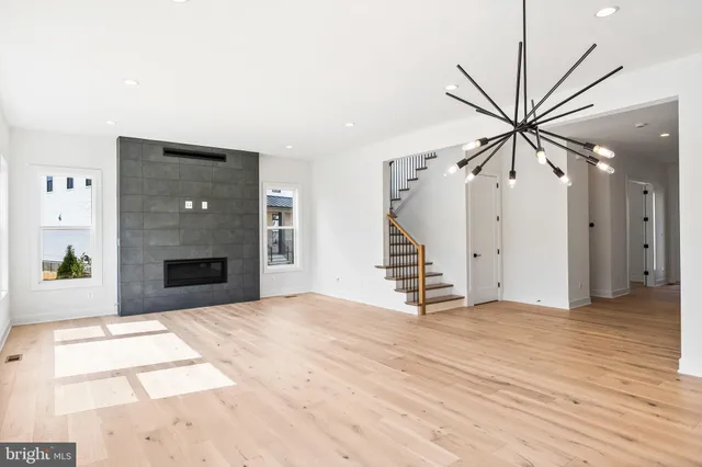 a kitchen with stainless steel appliances granite countertop a stove and a refrigerator