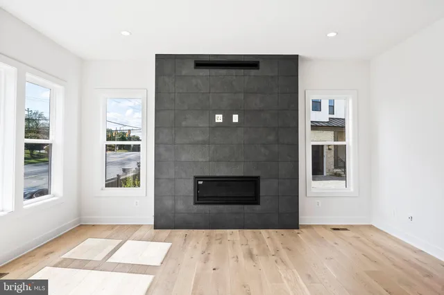 a kitchen with stainless steel appliances kitchen island a large island in the center