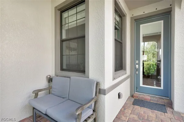 a view of an entryway with sitting area