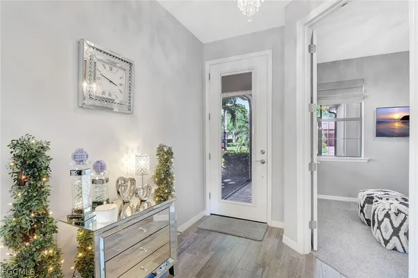 a view of room with window and hallway