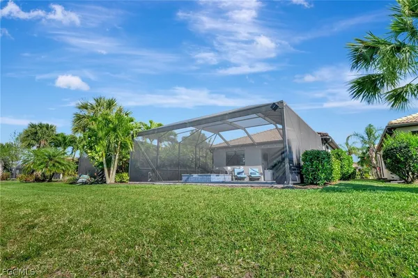an aerial view of a houses with outdoor space