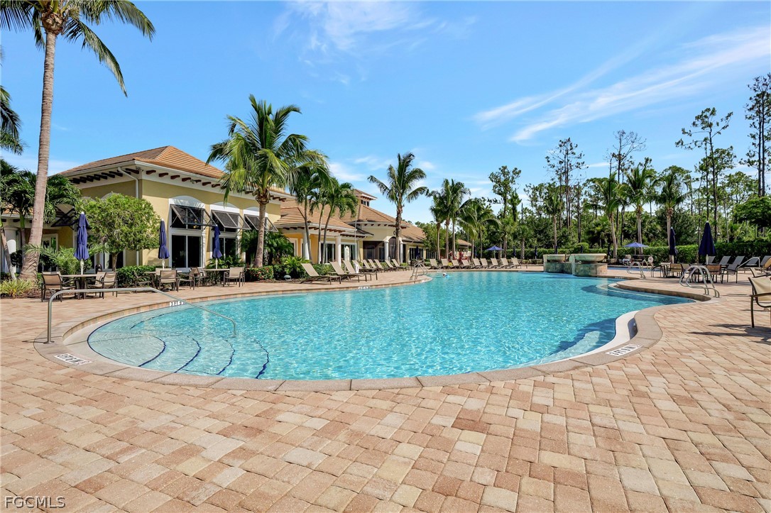 10908 Clarendon Street Fort Myers, FL 33913 - Photo 40 of 49 a view of a swimming pool with a patio