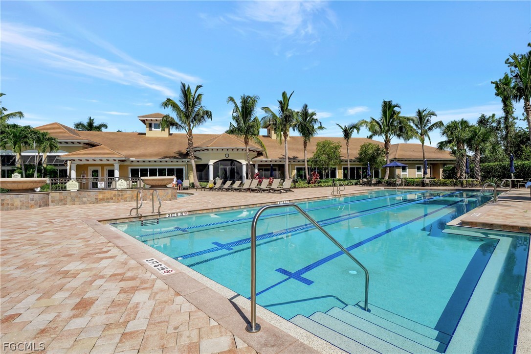 10908 Clarendon Street Fort Myers, FL 33913 - Photo 41 of 49 a view of swimming pool with outdoor seating