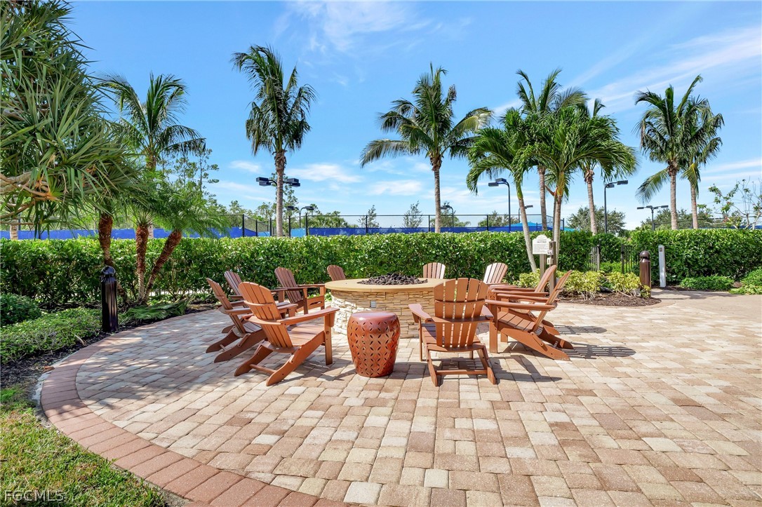 10908 Clarendon Street Fort Myers, FL 33913 - Photo 44 of 49 a view of a patio with a table and chairs