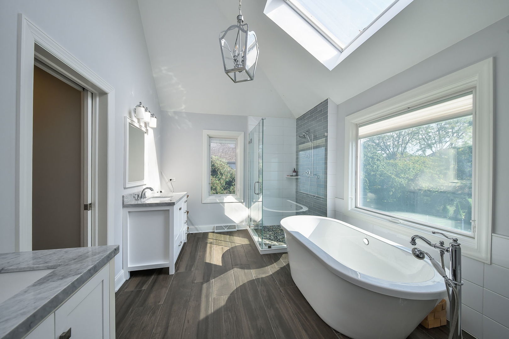 24 Winners Cup Circle Wheaton, IL 60189 - Photo 22 of 46 a large spacious bathroom with a granite countertop tub sink and mirror