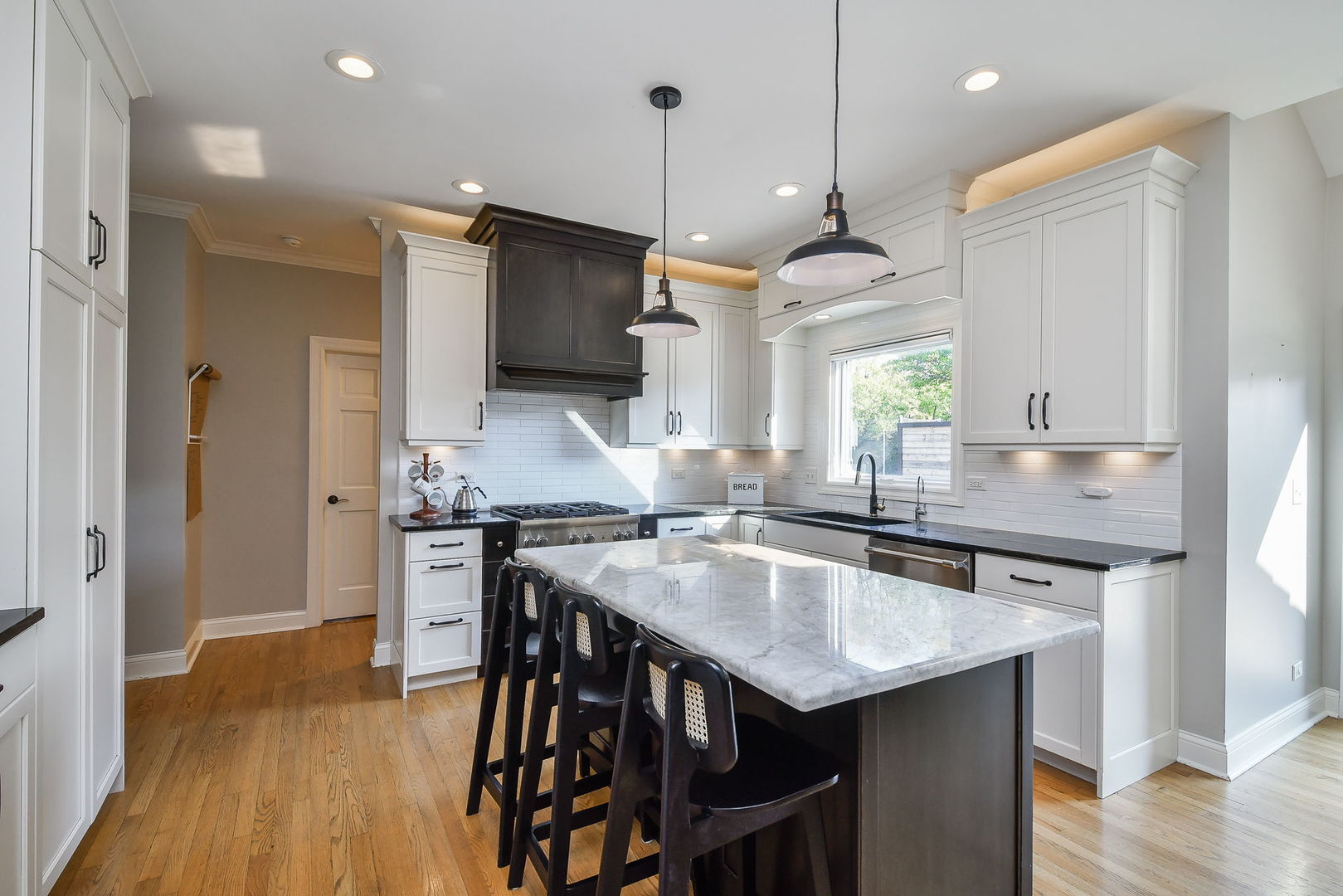 24 Winners Cup Circle Wheaton, IL 60189 - Photo 8 of 46 a kitchen with a stove a sink and a refrigerator