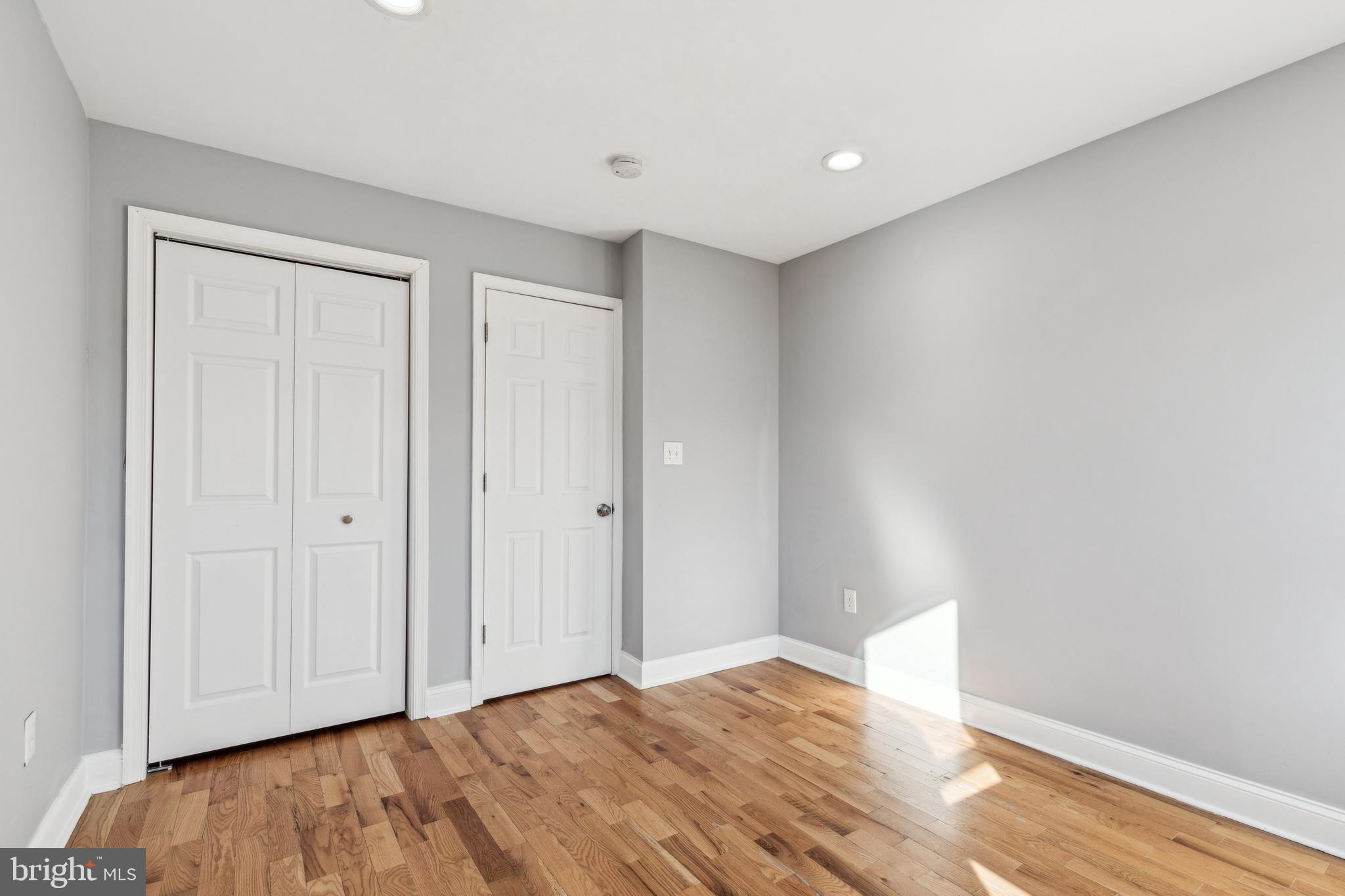 712 North Duncan Street Baltimore, MD 21205 - Photo 14 of 27 a view of room with wooden floor