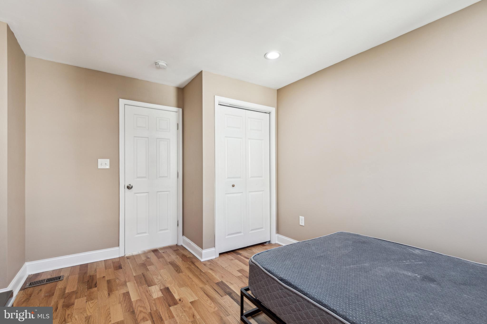 712 North Duncan Street Baltimore, MD 21205 - Photo 21 of 27 a view of a room with wooden floor and bathroom