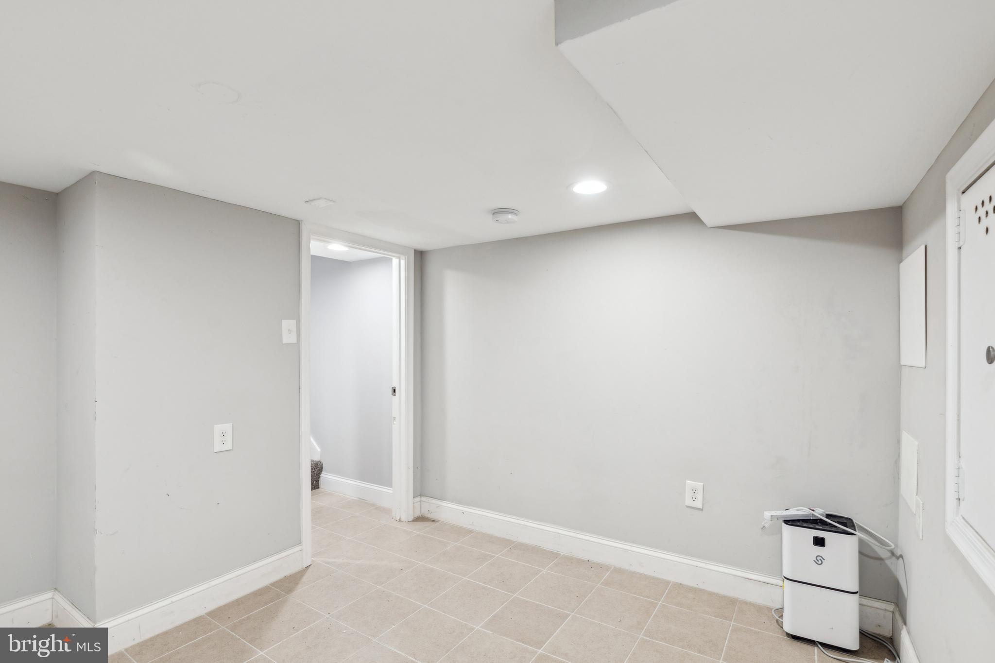 712 North Duncan Street Baltimore, MD 21205 - Photo 24 of 27 an empty room with a door