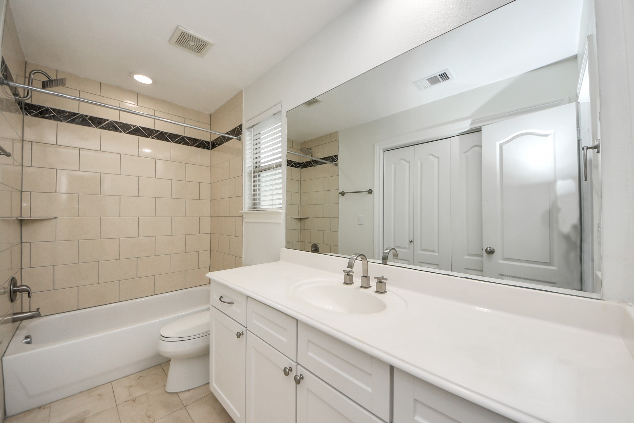 5526 Crooms Street Houston, TX 77007 - Photo 42 of 49 a bathroom with a sink a toilet and shower